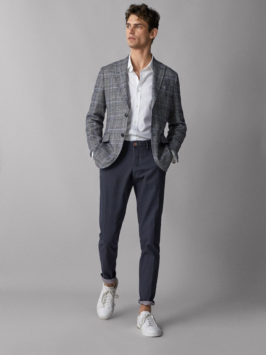 Яркие варианты комбинирования мужских брюк в клетку с одеждой